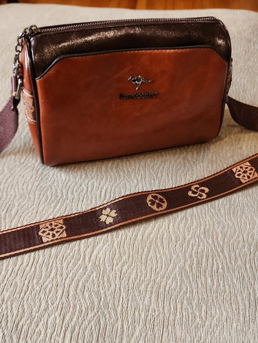 Brown Leather Crossbody Messenger Bag with Patterned Strap